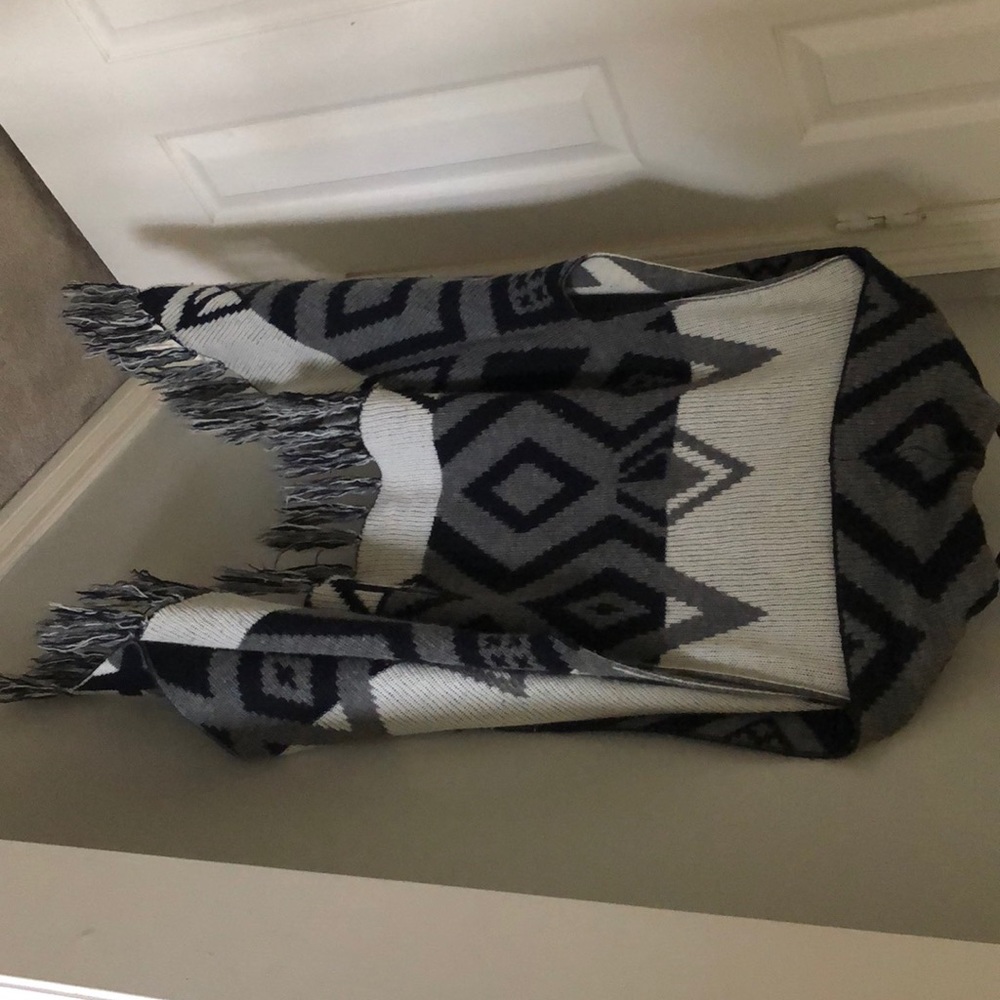 A sleeveless sweater to go over a top